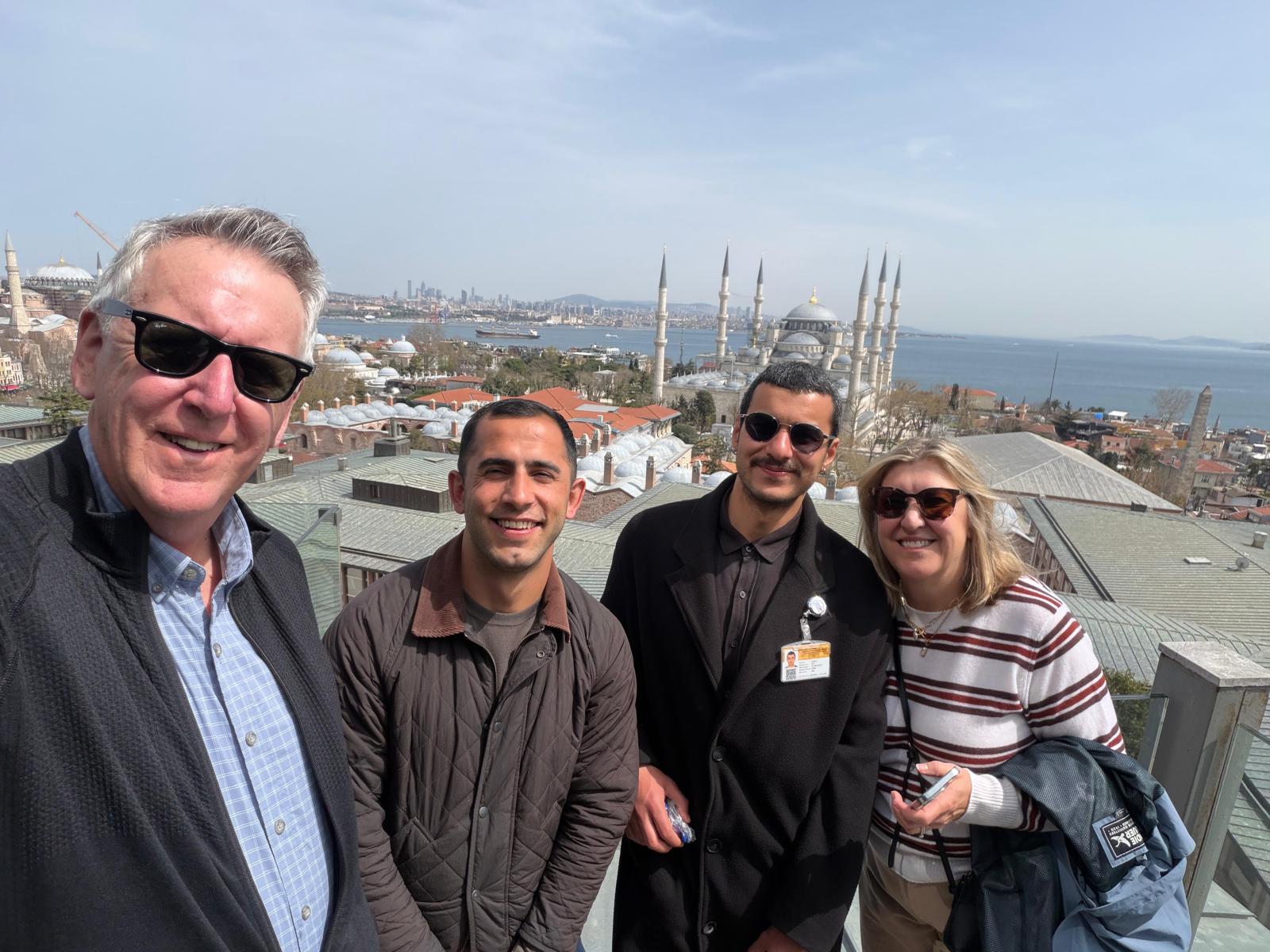 Guests on a Sultanahmet rooftop with the Bosphorus view